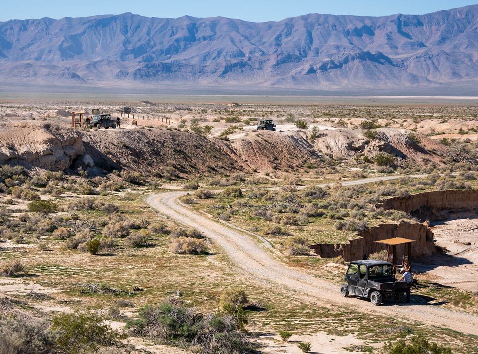 The course follows the wash, with a cart path running between stations. October 2023.