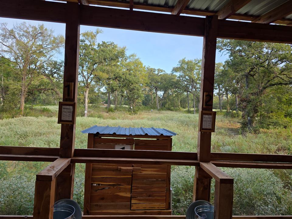 Looking out from stands 1 and 2 toward a trap house.