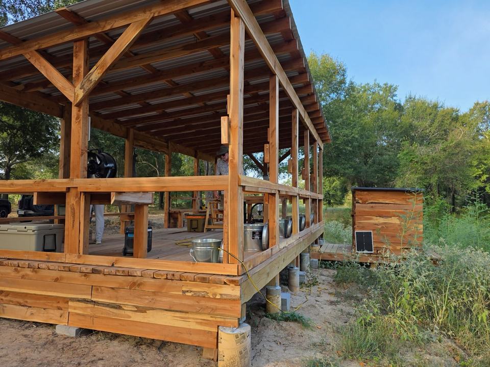 The deck and a solar-powered trap house.